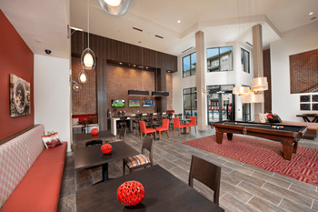 a resident clubhouse with a pool table and ping pong table